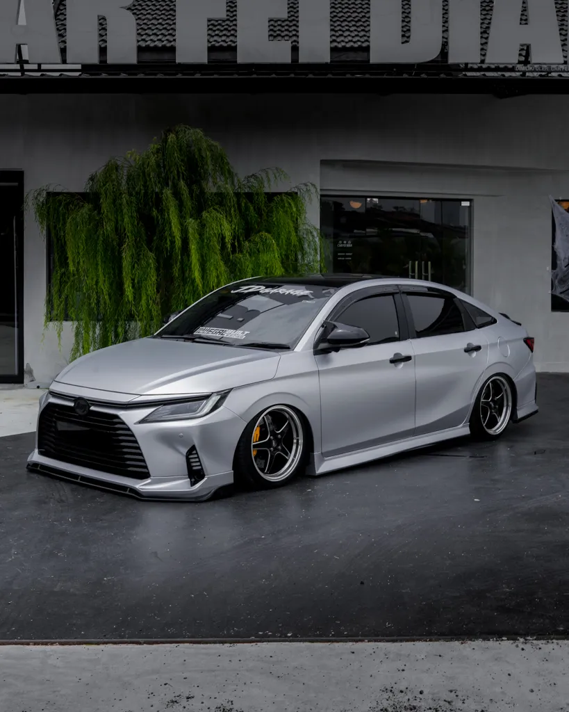 Winson's Toyota Vios in satin silver — completed wrap at Carfeidian